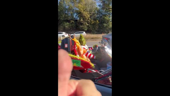 Mr. Grinch spotted on decorated three-wheeled vehicle in Tennessee, USA