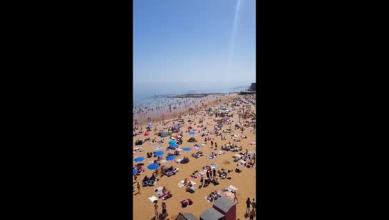 Crowds fill Broadstairs beach during May heatwave in Kent, England, UK