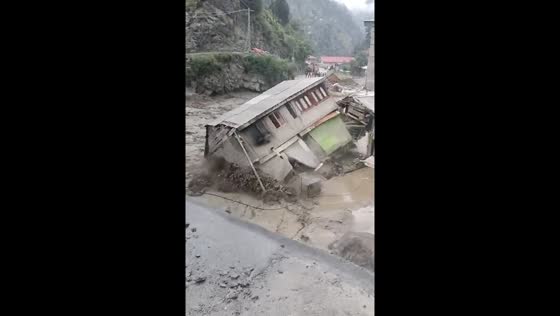 House falls into flood waters in Kaghan Valley, Pakistan