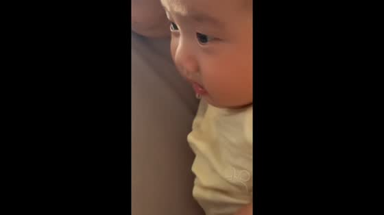 Baby adorably drools over hot pot food in Liaoning, China
