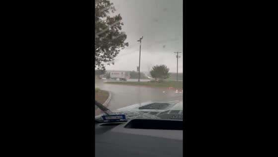 Heavy rain, hail, and distant tornado forming near Cleburne, Texas, USA