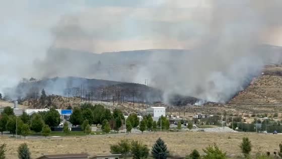 Transfer Fire burns hillside near Lake Chelan in Washington, USA