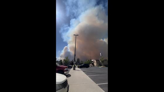 Massive smoke plume rises as Old Trails Fire grows near Spokane, USA