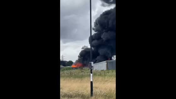 Industrial estate fire sends towering smoke plume over Washington in Sunderland, England, UK