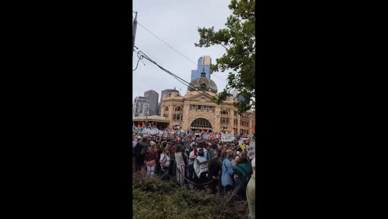 Mass protest opposing Herzog at Flinders Street Station in Melbourne, Australia