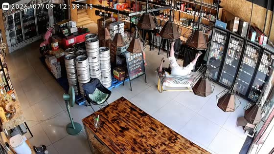Man's laughter ends with tumble from rocking lounge chair in Inner Mongolia, China