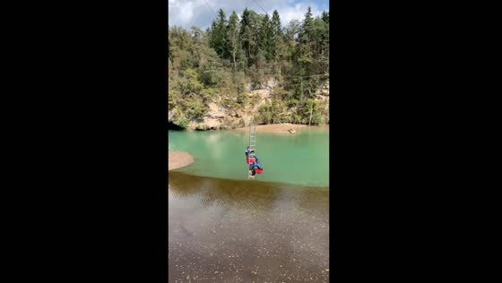 Thrilling mid-air ziplining dive into Slovenian waters