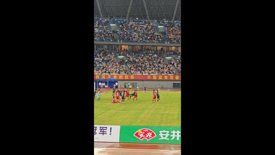 Blue team scores with bicycle kick during football match in Jiangsu, China