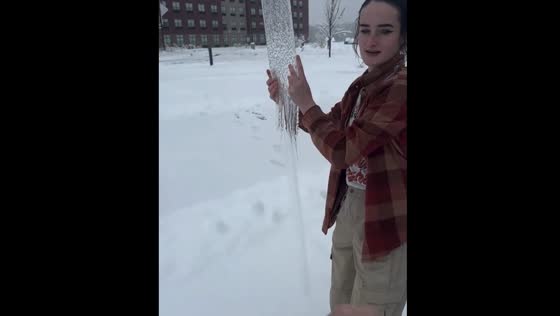 Friend shatters ice sheet at Southern Illinois University