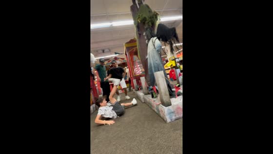 Child in San Antonio scared by Halloween decoration jumps back and falls