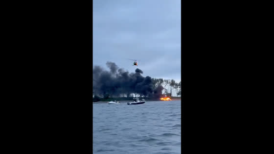 Boat with 22 people catches fire in New York, United States