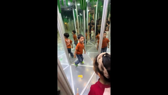 Boy gets fooled by mirror maze and bumps into reflection in Guangdong, China