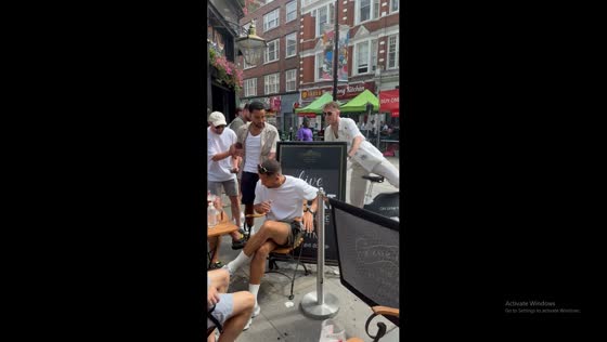 Bicyclist makes clumsy entrance by crashing into signboard in London, England, UK