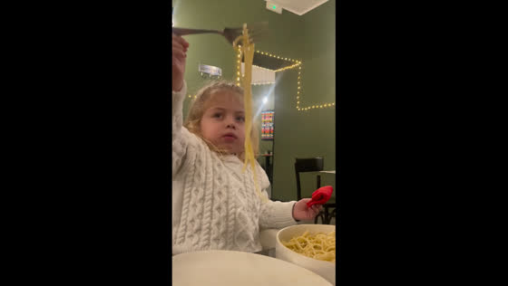 Little girl twirls spaghetti like a pro in Rome, Italy