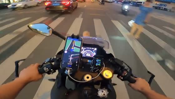 Motorcyclist injured after hitting ball on road in Guangdong, China