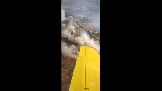 Aerial view: firefighter's perspective on wildfires in Córdoba, Argentina