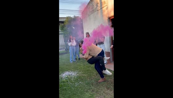 Gender reveal celebration ends in joyful fall after pink smoke surprise in Buenos Aires, Argentina