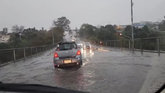 Flooding on Bond Street overbridge in Kingsland, New Zealand