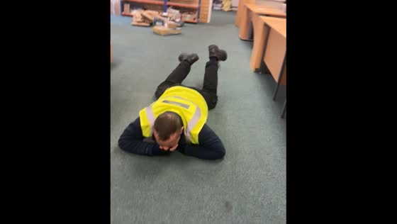 Person falls and hits mouth while doing a trick on the floor in Mansfield