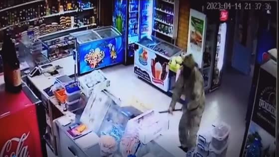 Man in camouflage uniform smashes shop with crowbar in Volgograd, Russia, causing extensive damage