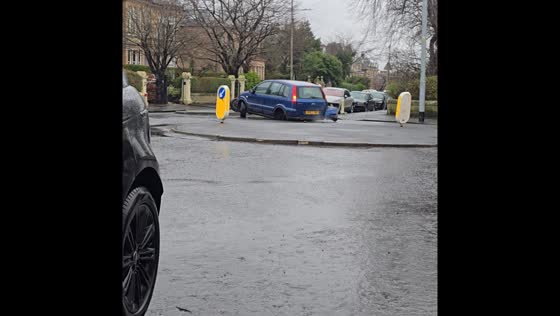 Car loses entire axle on roundabout in Glasgow, Scotland, UK