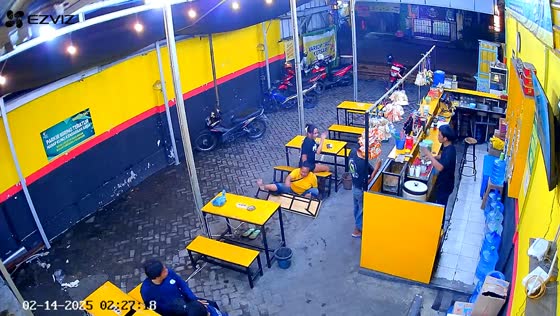 Woman loses balance and falls from chair in Surabaya, Indonesia
