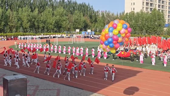 Children accidentally release balloons during a ceremony in Inner Mongolia, China