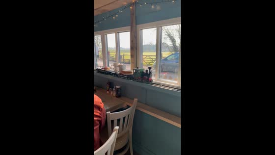Mini train delivers birthday breakfast to elderly couple in Newenden, England, UK