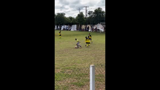 Dribble master! kid shows off moves in football match 