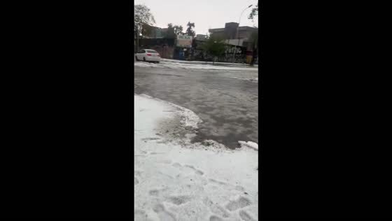 Severe hailstorm blankets streets and disrupts transport in Santiago, Chile