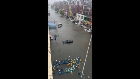 Severe flooding submerges parked cars in Liaoning, China