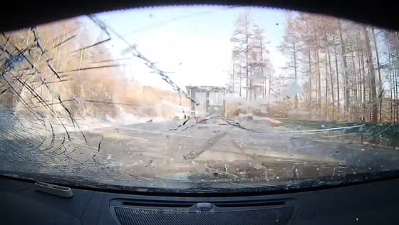 Debris from moving truck shatters car windshield in Jilin, China