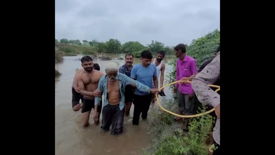 Elderly man rescued from water by villagers in Vadodara, Gujarat, India