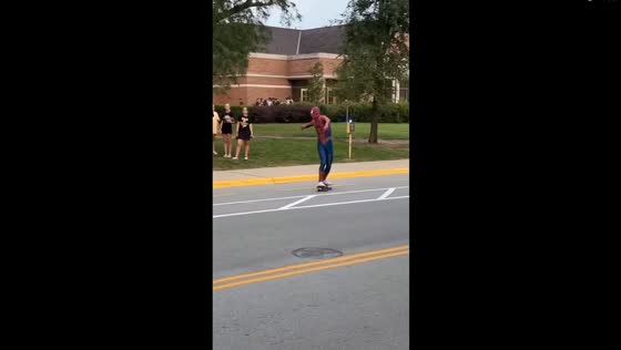 Skateboarding Spiderman comes to the rescue after biker's tumble in West Lafayette