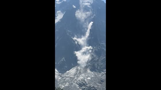Massive rockfall sends dust plume down Aiguille du Midi in Chamonix, France