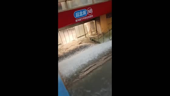 Flash floodwaters pour into underground supermarket in Shanghai, China