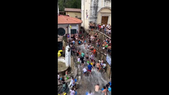 Water fight fills the streets during A Chiena festival in Salerno, Italy