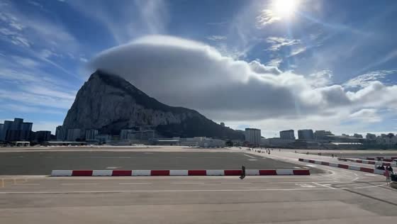 Levanter cloud provides shade over Gibraltar in sunny weather