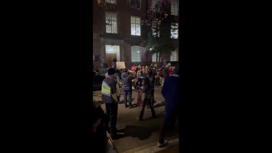 Protesters gather outside Lisner Auditorium in Washington, USA