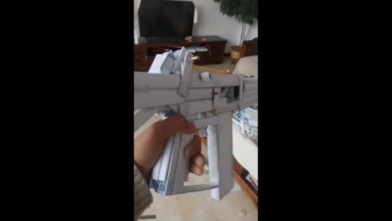 Creative rubber band toy rifle made from paper in Hebei, China