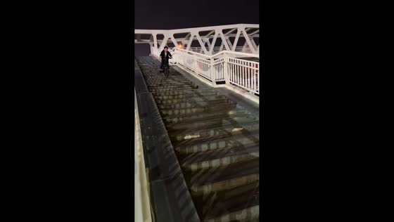 Boys ride down stairs and crash on the wall in Linyi, China