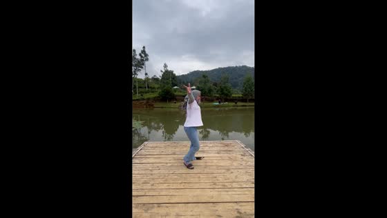 Woman falls while filming content on wooden platform in Sumedang, Indonesia