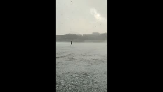 Hailstones blanket field during sudden storm in Datong, China