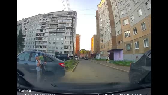 Boy crosses himself after near-car collision in Arkhangelsk