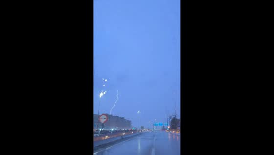 Powerful lightning strike illuminates stormy sky in Badalona, Spain