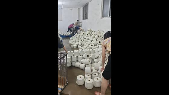 Floodwaters collapse yarn storage inside weaving factory in Jiangsu, China