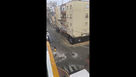 Torrential rain causes powerful street flooding in Seville, Spain