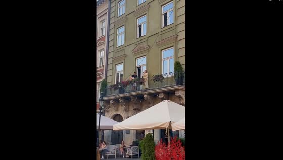 Harmonious sunset serenade: a charming evening of music and love in Lviv's town square