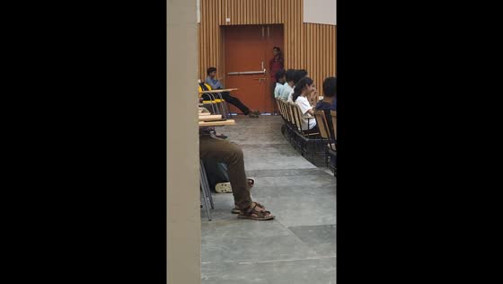 Student's stealthy entrance to lecture hall sparks laughter
