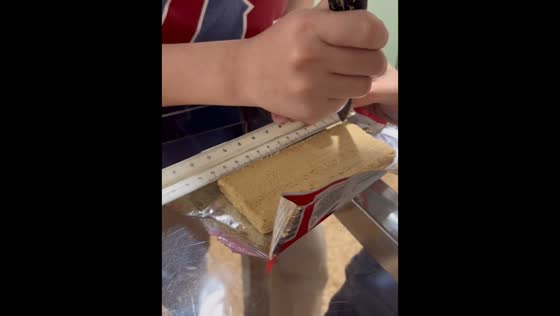 Perfectly measured chocolate bar cutting in Buenos Aires, Argentina